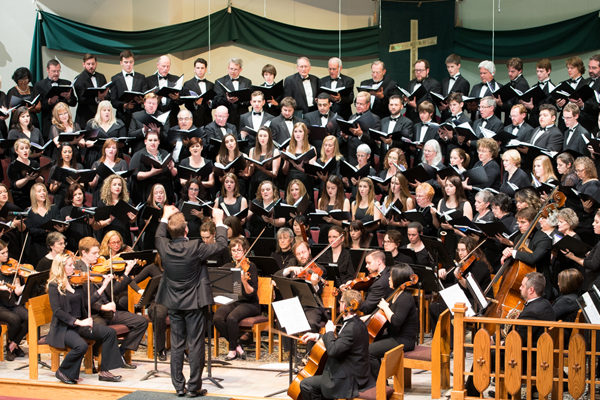 Round Rock Community Choir singing in a church.