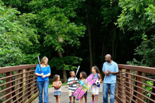 family walking in a park