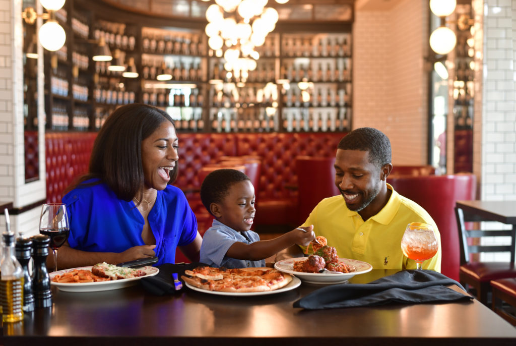 image of a family at dinner. 